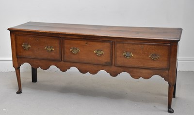 Lot 1051 - An 18th century oak dresser base