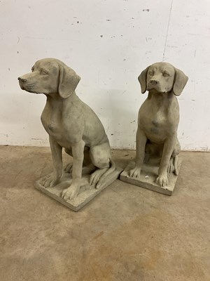 Lot 665 - A pair of resin labradors for the garden