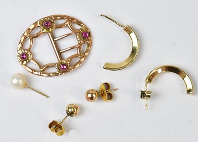Lot 972 - A Victorian yellow metal belt buckle set with...