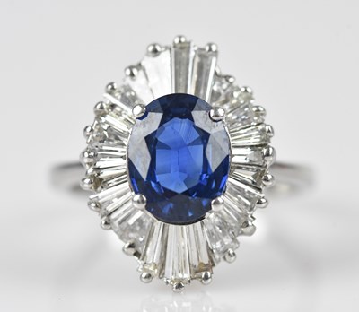 Lot 366 - A good diamond and sapphire dress ring, the...