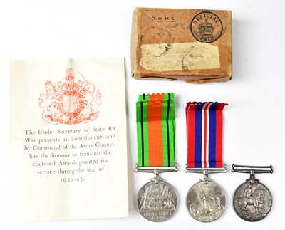 Lot 677 - Two WWII era medals, The Defence Medal and War...