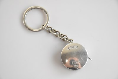 Lot 124 - TIFFANY & CO; a novelty sterling silver tape...
