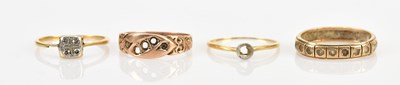 Lot 510 - Two 18ct gold rings, including a diamond set...