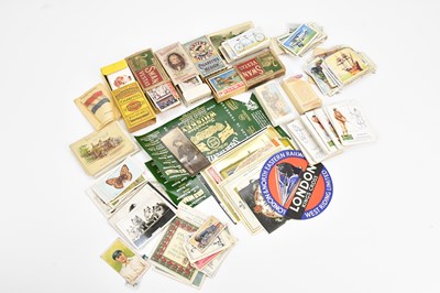 Lot 2381 - A collection of cigarette cards and cigarette...