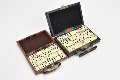 Lot 2113 - Two sets of cased dominoes (2).