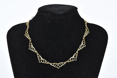 Lot 260 - A 9ct yellow gold angel wing twelve panel...