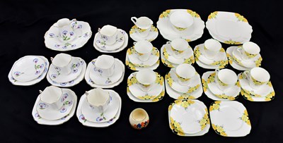 Lot 1579 - CLARICE CLIFF; a 'Crocus' pattern preserve pot,...