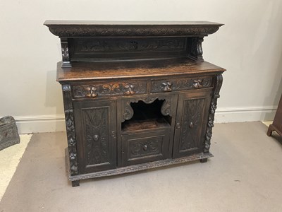 Lot 1062 - A late Victorian carved and stained oak...