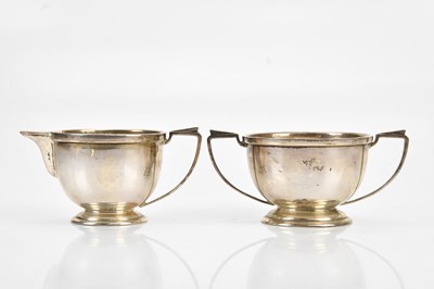 Lot 495 - C E; a George V hallmarked silver twin handled...