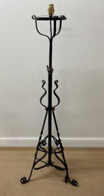 Lot 597 - A bespoke made iron adjustable height standard...