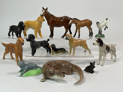 Lot 206 - BRANKSOME CHINA; a quantity of ceramic animals...