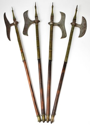 Lot 634 - A collection of four African short length axes,...