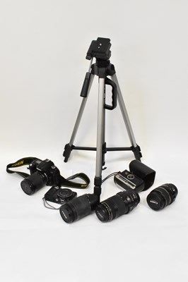 Lot 470 - A Nikon F80 film SLR camera, in case with...