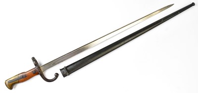 Lot 606 - A French model 1874 sword bayonet, the back of...