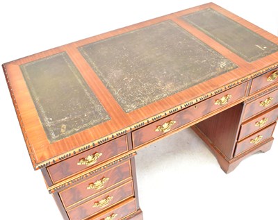 Lot 44 - A Regency-style mahogany pedestal desk, the...