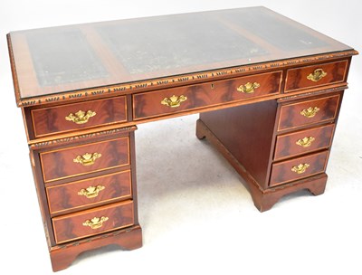 Lot 44 - A Regency-style mahogany pedestal desk, the...