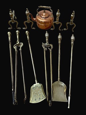 Lot 126 - Two sets of brass companion sets, length 71cm,...