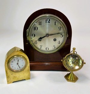 Lot 307 - A mahogany banded inlaid mantel clock, height...