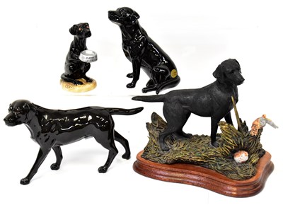 Lot 106 - BESWICK; three figures of dogs, 'Lunchtime Lab'...