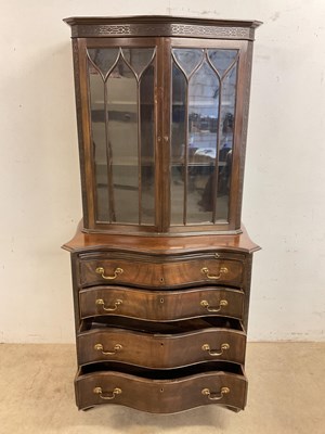 Lot 698 - An Edwardian mahogany bookcase on chest, the...