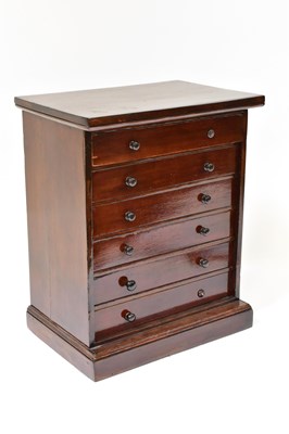 Lot 287 - A stained wood table top collectors chet, with...