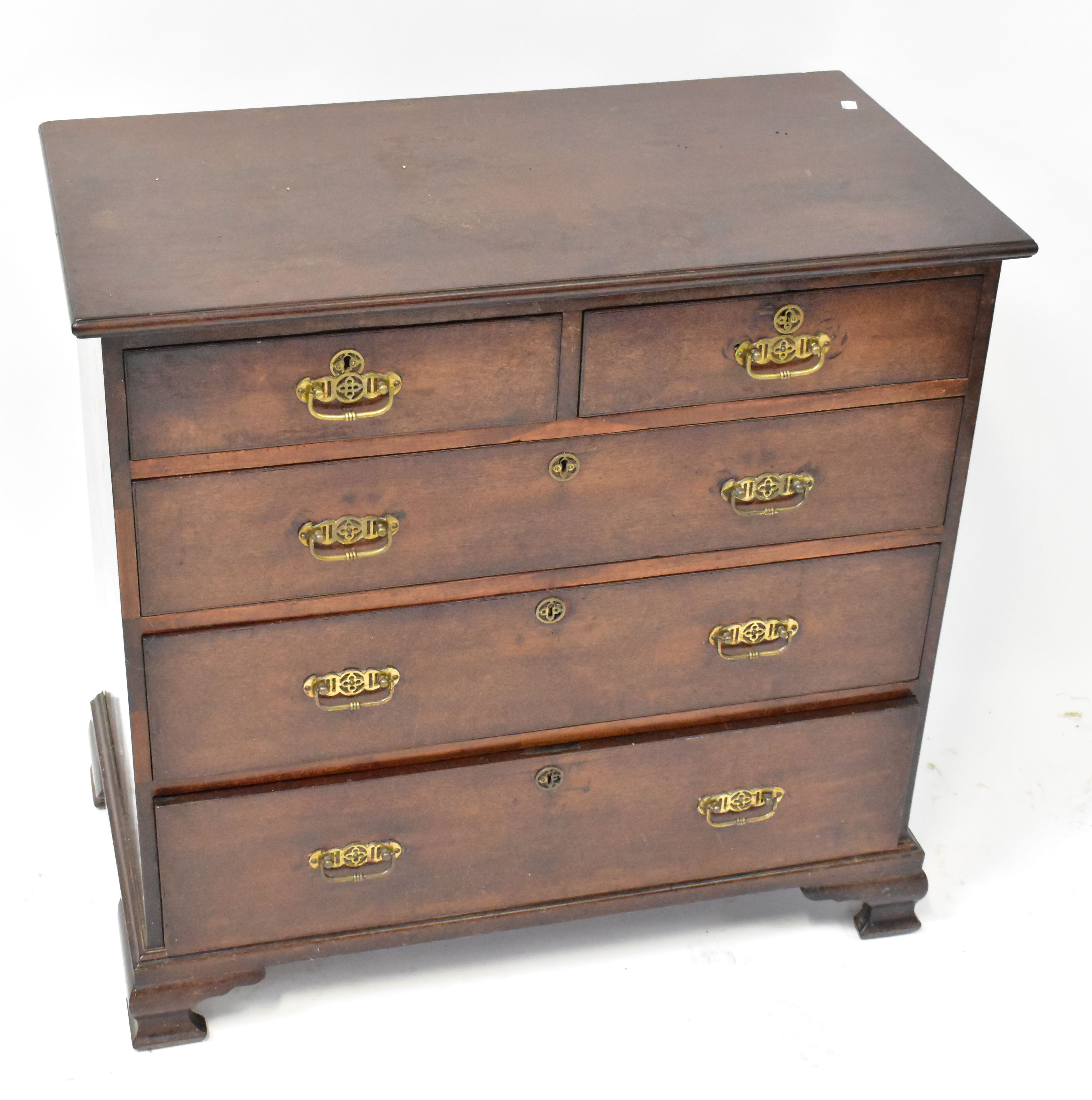 Lot 31 - A George III oak chest of two short over