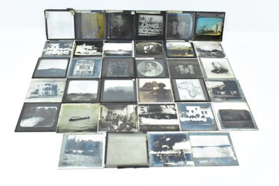 Lot 331 - A quantity of thirty-five magic lantern slides,...