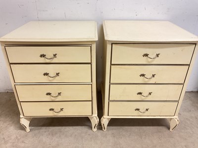 Lot 558 - A pair of modern cream painted four drawer...