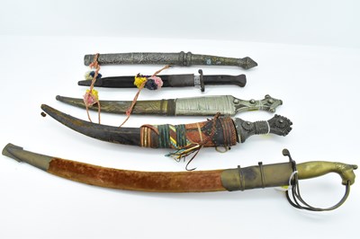 Lot 630 - Five various Middle Eastern and other bladed...