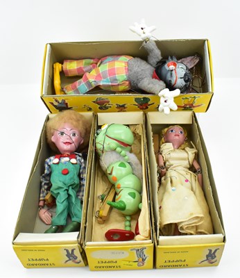 Lot 264 - PELHAM PUPPETS; four boxed marionettes...