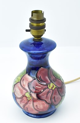 Lot 72 - MOORCROFT; an 'Anemone' pattern table lamp on...