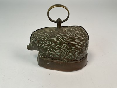 Lot 129 - A door stop in the form of a hedgehog, height...