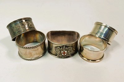 Lot 546 - A collection of six hallmarked silver napkin...