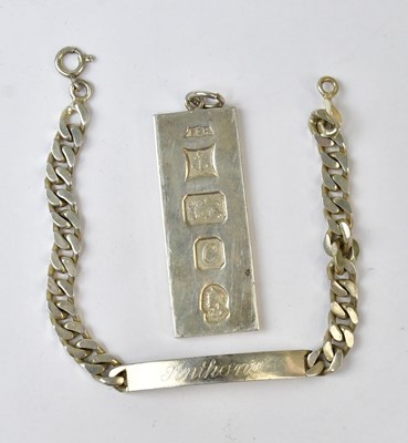 Lot 975 - An Elizabeth II hallmarked silver ingot...