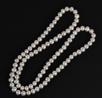 Lot 347 - A large pearl necklace set with oval shaped...