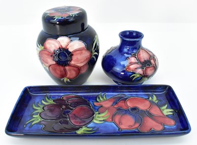 Lot 133 - MOORCROFT; three 'Anemone' pattern items,...