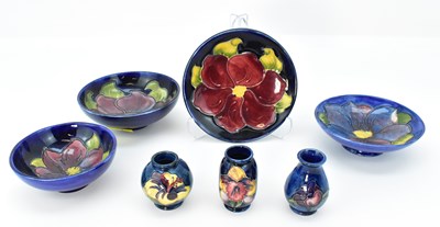 Lot 138 - MOORCROFT; seven small items of pottery all in...
