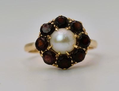 Lot 478 - A 9ct yellow gold pearl and garnet cluster...