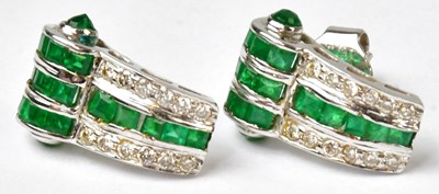Lot 949 - A pair of 18ct white gold stud earrings set...
