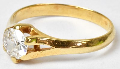 Lot 890 - A yellow metal diamond solitaire ring, the...