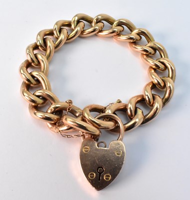 Lot 907 - A 9ct rose gold wide open/hollow link bracelet...