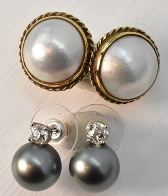 Lot 953 - A pair of black pearl and tiny diamond set...