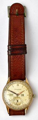 Lot 1034 - MOVADO; a yellow metal watch head, the dial...