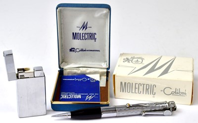 Lot 316 - A Colibri 'Molectric' lighter, with case,...
