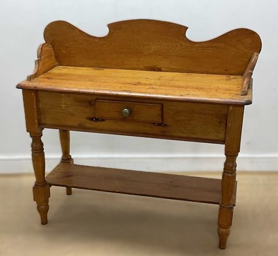 Lot 627 - A pitch pine wash stand with scrolled gallery...