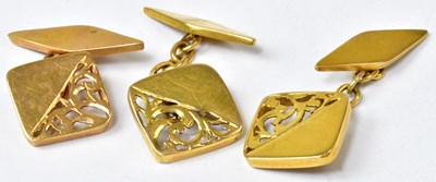 Lot 957 - A pair of yellow metal cufflinks with pierced...