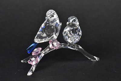 Lot 232 - SWAROVSKI; a crystal figure group of two...