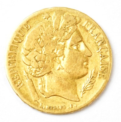 Lot 843 - A French Republic twenty francs gold coin,...