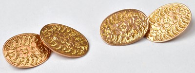Lot 960 - A pair of 9ct yellow gold oval cufflinks with...