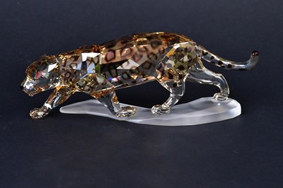 Lot 243 - SWAROVSKI; a Crystal Golden Shine figure,...